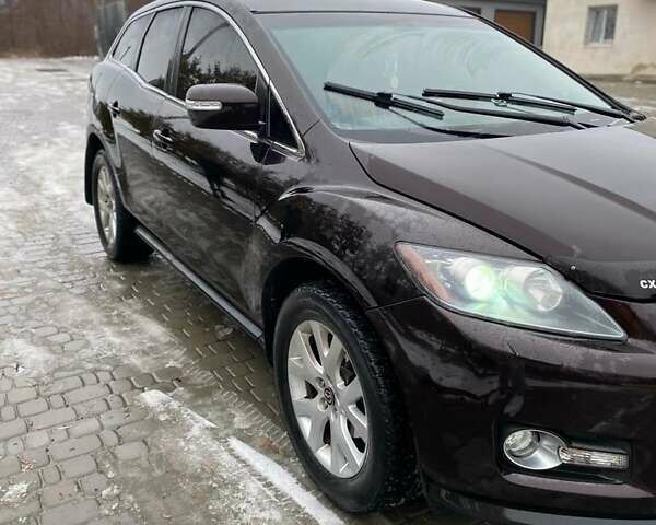Черный Мазда СХ-7, объемом двигателя 2.3 л и пробегом 324 тыс. км за 7500 $, фото 3 на Automoto.ua