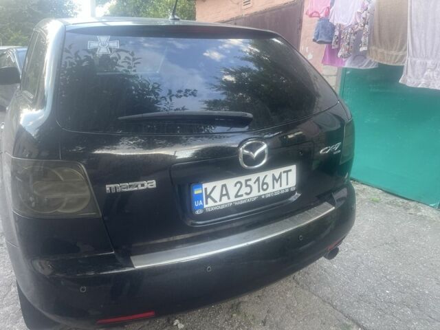 Черный Мазда СХ-7, объемом двигателя 2.3 л и пробегом 200 тыс. км за 6300 $, фото 3 на Automoto.ua