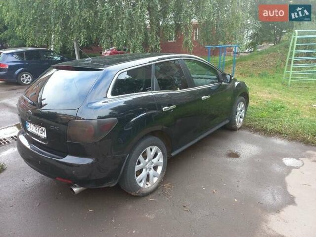 Черный Мазда СХ-7, объемом двигателя 2.3 л и пробегом 222 тыс. км за 5500 $, фото 1 на Automoto.ua