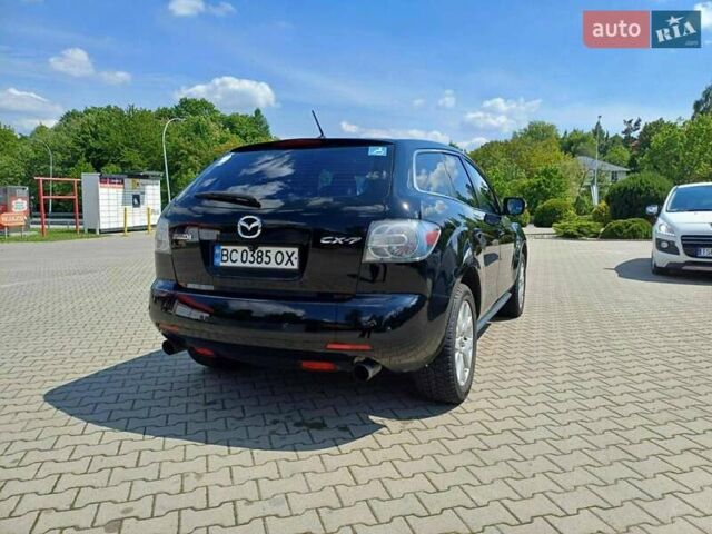 Черный Мазда СХ-7, объемом двигателя 2.26 л и пробегом 145 тыс. км за 7800 $, фото 2 на Automoto.ua