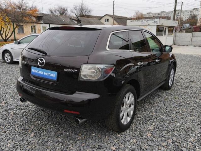 Черный Мазда СХ-7, объемом двигателя 2.3 л и пробегом 135 тыс. км за 7000 $, фото 1 на Automoto.ua