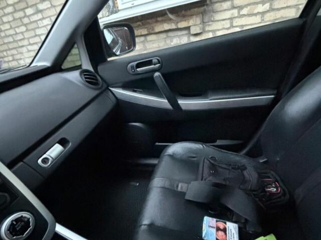 Черный Мазда СХ-7, объемом двигателя 2.3 л и пробегом 190 тыс. км за 6800 $, фото 5 на Automoto.ua