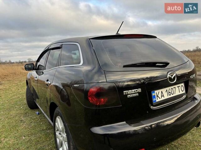 Черный Мазда СХ-7, объемом двигателя 2.26 л и пробегом 220 тыс. км за 7950 $, фото 42 на Automoto.ua