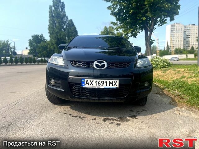 Черный Мазда СХ-7, объемом двигателя 2.3 л и пробегом 180 тыс. км за 6000 $, фото 1 на Automoto.ua