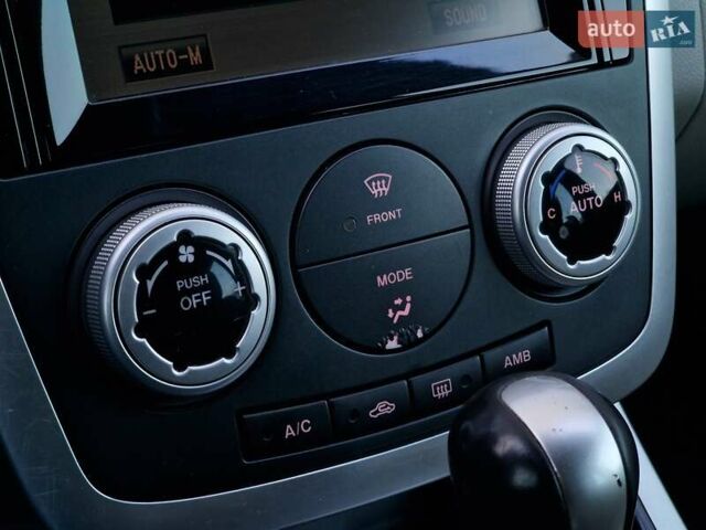 Черный Мазда СХ-7, объемом двигателя 2.3 л и пробегом 115 тыс. км за 8990 $, фото 44 на Automoto.ua