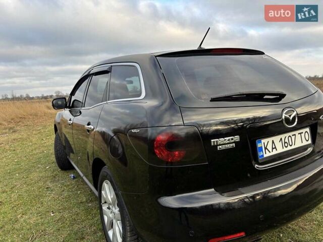 Черный Мазда СХ-7, объемом двигателя 2.26 л и пробегом 220 тыс. км за 7950 $, фото 38 на Automoto.ua