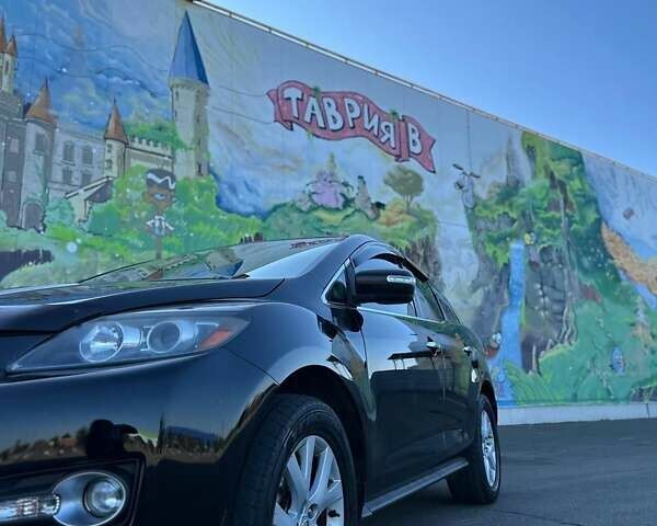 Черный Мазда СХ-7, объемом двигателя 2.3 л и пробегом 200 тыс. км за 6700 $, фото 4 на Automoto.ua