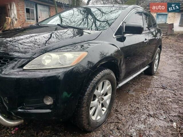 Чорний Мазда СХ-7, об'ємом двигуна 2.3 л та пробігом 210 тис. км за 6200 $, фото 1 на Automoto.ua