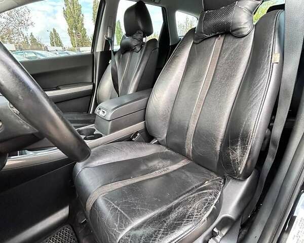 Черный Мазда СХ-7, объемом двигателя 2.26 л и пробегом 116 тыс. км за 7200 $, фото 18 на Automoto.ua