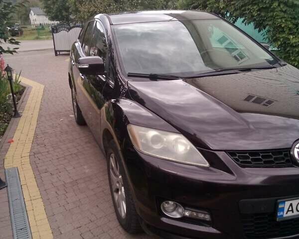 Черный Мазда СХ-7, объемом двигателя 2.26 л и пробегом 230 тыс. км за 7000 $, фото 1 на Automoto.ua