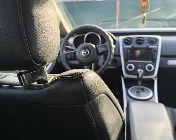 Черный Мазда СХ-7, объемом двигателя 2.26 л и пробегом 181 тыс. км за 5500 $, фото 15 на Automoto.ua