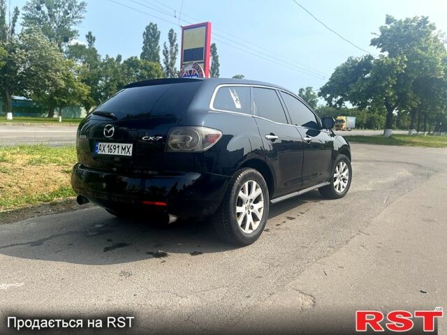 Черный Мазда СХ-7, объемом двигателя 2.3 л и пробегом 180 тыс. км за 6000 $, фото 3 на Automoto.ua