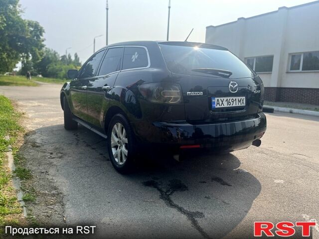 Черный Мазда СХ-7, объемом двигателя 2.3 л и пробегом 180 тыс. км за 6000 $, фото 2 на Automoto.ua