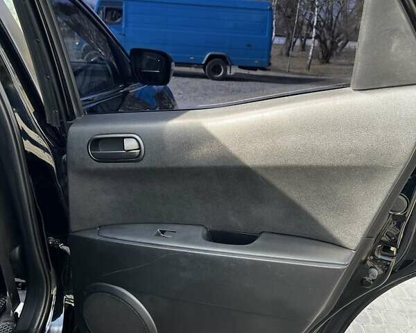 Черный Мазда СХ-7, объемом двигателя 2.3 л и пробегом 220 тыс. км за 7000 $, фото 10 на Automoto.ua