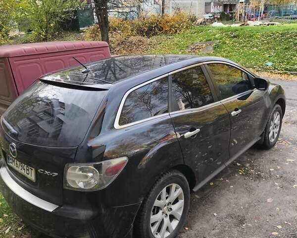 Черный Мазда СХ-7, объемом двигателя 2.26 л и пробегом 115 тыс. км за 7602 $, фото 1 на Automoto.ua