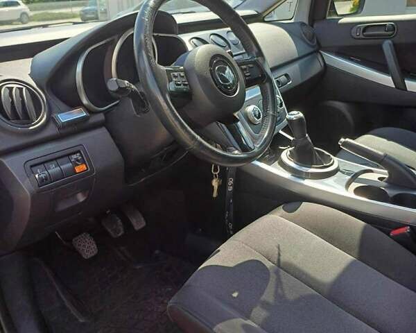 Черный Мазда СХ-7, объемом двигателя 2.26 л и пробегом 145 тыс. км за 7800 $, фото 5 на Automoto.ua