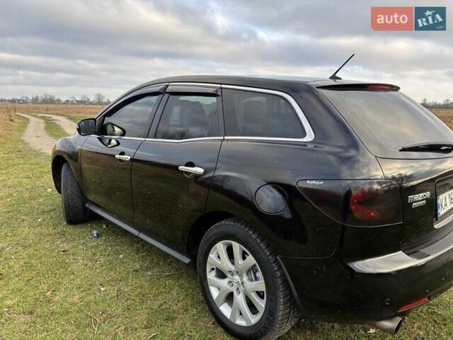 Черный Мазда СХ-7, объемом двигателя 2.26 л и пробегом 220 тыс. км за 7950 $, фото 33 на Automoto.ua