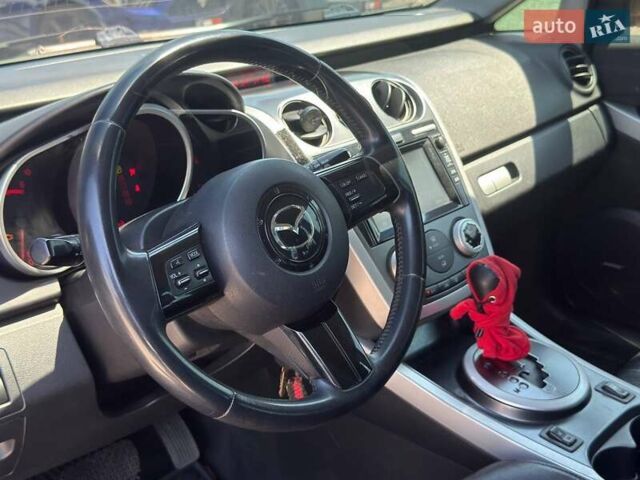 Черный Мазда СХ-7, объемом двигателя 2.3 л и пробегом 180 тыс. км за 5600 $, фото 13 на Automoto.ua