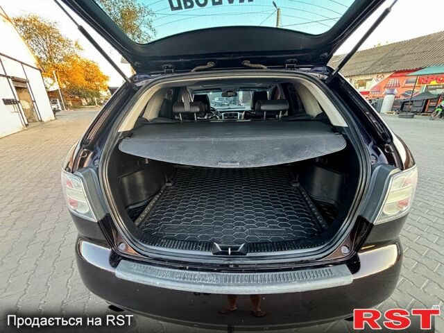 Черный Мазда СХ-7, объемом двигателя 2.3 л и пробегом 143 тыс. км за 6650 $, фото 11 на Automoto.ua