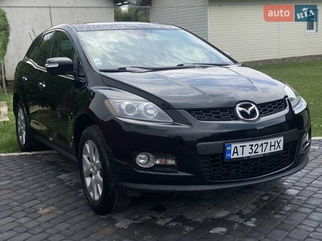 Черный Мазда СХ-7, объемом двигателя 2.3 л и пробегом 210 тыс. км за 7300 $, фото 1 на Automoto.ua