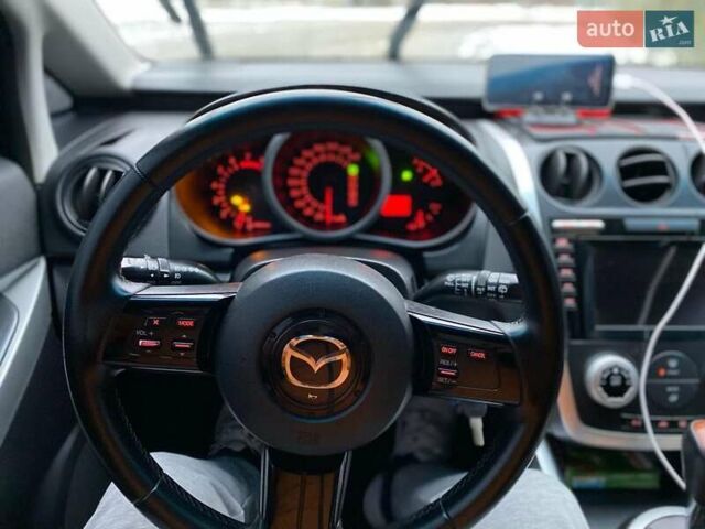Черный Мазда СХ-7, объемом двигателя 2.3 л и пробегом 324 тыс. км за 7500 $, фото 7 на Automoto.ua
