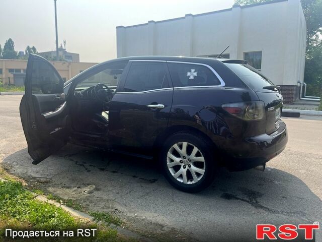 Черный Мазда СХ-7, объемом двигателя 2.3 л и пробегом 180 тыс. км за 6000 $, фото 4 на Automoto.ua