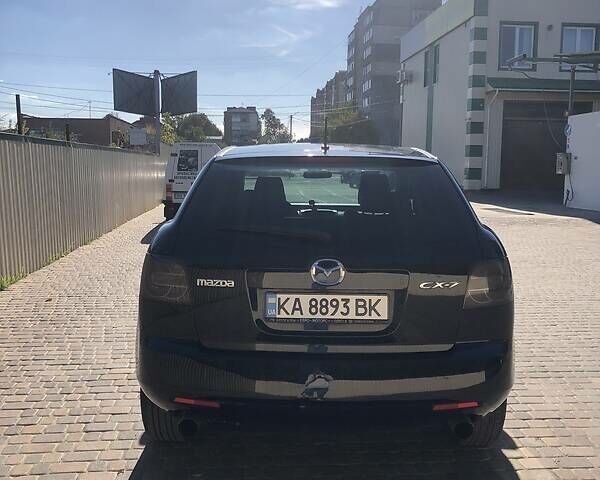 Черный Мазда СХ-7, объемом двигателя 2.3 л и пробегом 247 тыс. км за 5500 $, фото 4 на Automoto.ua