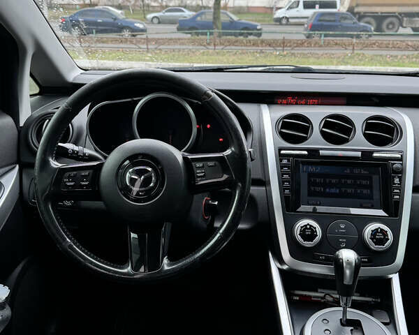 Черный Мазда СХ-7, объемом двигателя 2.3 л и пробегом 137 тыс. км за 7700 $, фото 24 на Automoto.ua