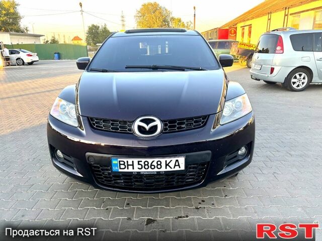 Черный Мазда СХ-7, объемом двигателя 2.3 л и пробегом 143 тыс. км за 6650 $, фото 1 на Automoto.ua