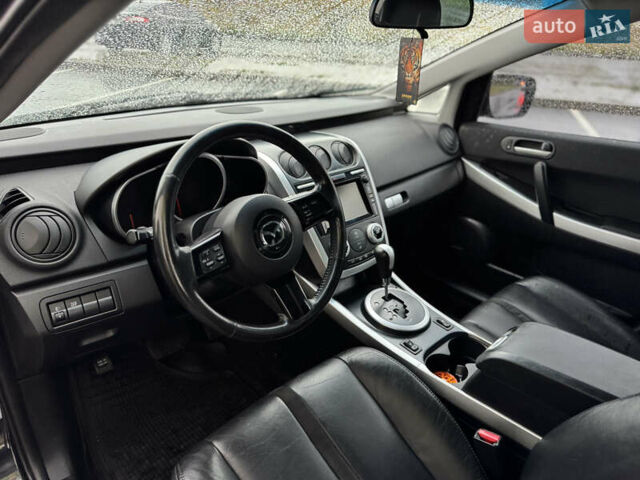 Черный Мазда СХ-7, объемом двигателя 2.3 л и пробегом 170 тыс. км за 7200 $, фото 16 на Automoto.ua