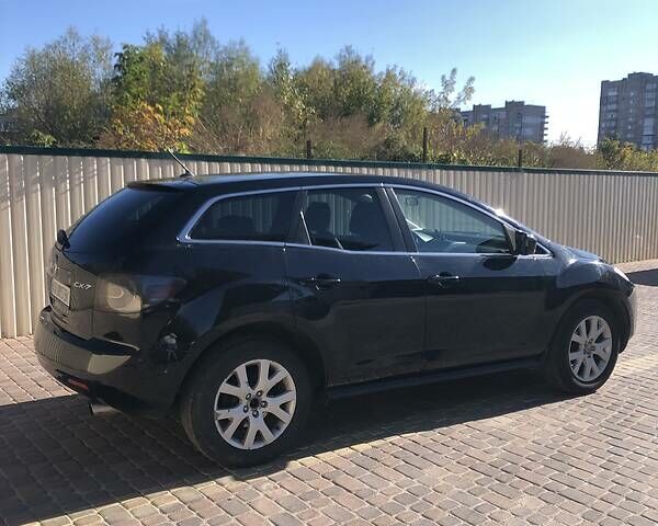 Черный Мазда СХ-7, объемом двигателя 2.3 л и пробегом 247 тыс. км за 5500 $, фото 2 на Automoto.ua