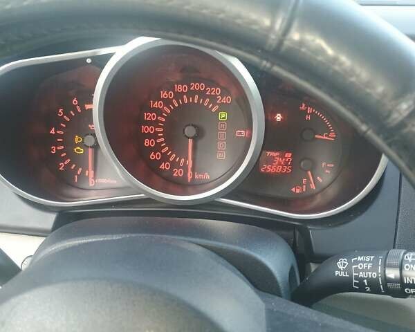 Черный Мазда СХ-7, объемом двигателя 2.3 л и пробегом 256 тыс. км за 6200 $, фото 1 на Automoto.ua