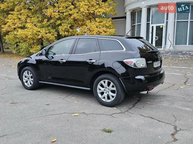 Черный Мазда СХ-7, объемом двигателя 2.26 л и пробегом 205 тыс. км за 5500 $, фото 1 на Automoto.ua