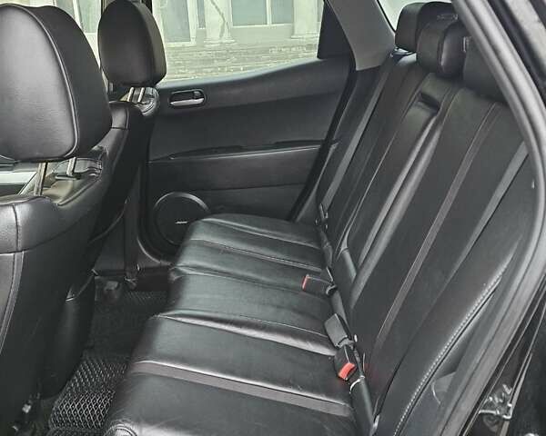 Черный Мазда СХ-7, объемом двигателя 2.26 л и пробегом 205 тыс. км за 5500 $, фото 17 на Automoto.ua