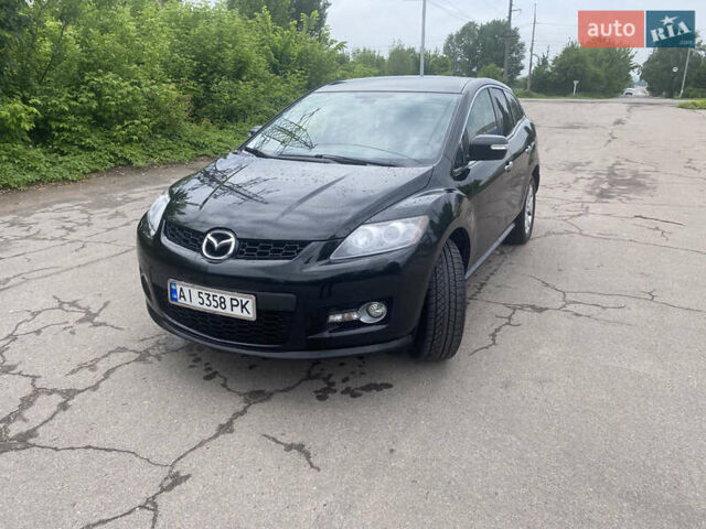 Черный Мазда СХ-7, объемом двигателя 2.26 л и пробегом 133 тыс. км за 7600 $, фото 20 на Automoto.ua