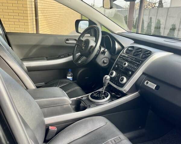 Черный Мазда СХ-7, объемом двигателя 2.3 л и пробегом 74 тыс. км за 7850 $, фото 3 на Automoto.ua