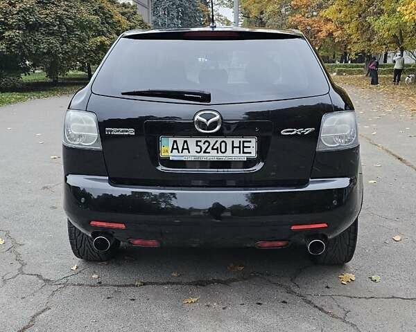 Черный Мазда СХ-7, объемом двигателя 2.26 л и пробегом 205 тыс. км за 5500 $, фото 5 на Automoto.ua