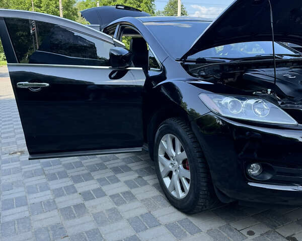 Чорний Мазда СХ-7, об'ємом двигуна 2.3 л та пробігом 137 тис. км за 7950 $, фото 18 на Automoto.ua