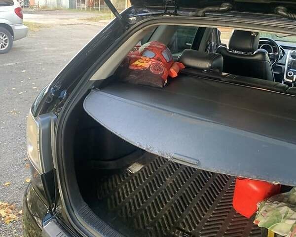 Черный Мазда СХ-7, объемом двигателя 2.3 л и пробегом 117 тыс. км за 6400 $, фото 7 на Automoto.ua