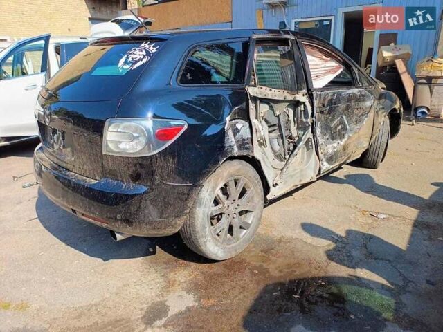 Черный Мазда СХ-7, объемом двигателя 2.26 л и пробегом 250 тыс. км за 3300 $, фото 3 на Automoto.ua