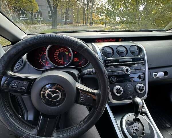 Черный Мазда СХ-7, объемом двигателя 2.26 л и пробегом 196 тыс. км за 7600 $, фото 2 на Automoto.ua