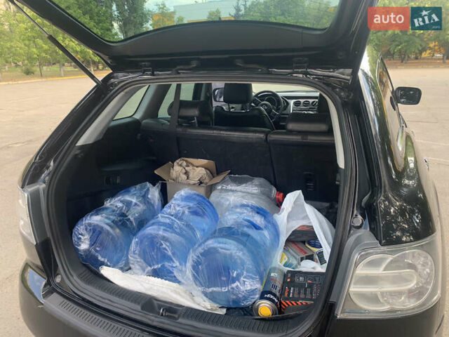 Чорний Мазда СХ-7, об'ємом двигуна 2.3 л та пробігом 160 тис. км за 6400 $, фото 4 на Automoto.ua