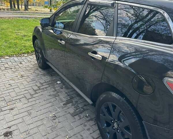 Черный Мазда СХ-7, объемом двигателя 2.26 л и пробегом 196 тыс. км за 7600 $, фото 4 на Automoto.ua
