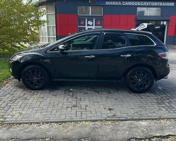 Черный Мазда СХ-7, объемом двигателя 2.26 л и пробегом 196 тыс. км за 7600 $, фото 3 на Automoto.ua