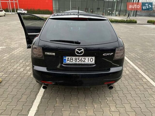 Черный Мазда СХ-7, объемом двигателя 2.3 л и пробегом 145 тыс. км за 7900 $, фото 10 на Automoto.ua