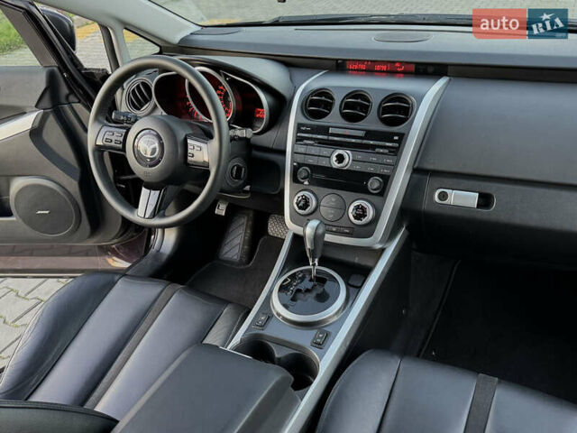 Черный Мазда СХ-7, объемом двигателя 2.3 л и пробегом 124 тыс. км за 7800 $, фото 54 на Automoto.ua