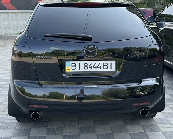 Черный Мазда СХ-7, объемом двигателя 2.3 л и пробегом 137 тыс. км за 8100 $, фото 4 на Automoto.ua