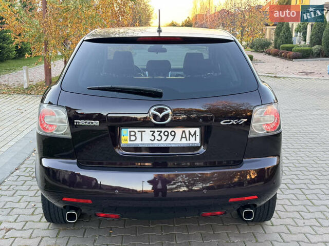 Черный Мазда СХ-7, объемом двигателя 2.3 л и пробегом 124 тыс. км за 7800 $, фото 13 на Automoto.ua