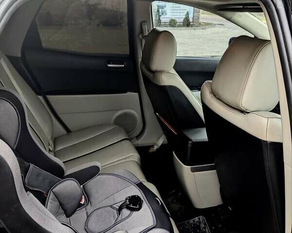 Черный Мазда СХ-7, объемом двигателя 2.3 л и пробегом 146 тыс. км за 7190 $, фото 16 на Automoto.ua