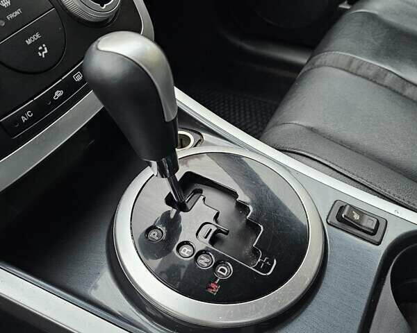 Черный Мазда СХ-7, объемом двигателя 2.26 л и пробегом 205 тыс. км за 5500 $, фото 13 на Automoto.ua